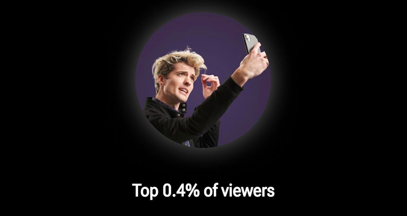 Grapefruit slice atop a pile of other slices